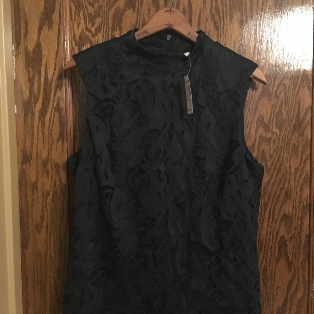 Green lace shell. Size large.